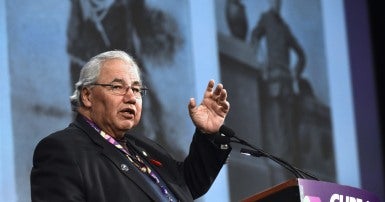 Justice Murray Sinclair speaking at podium at CUPE Convention