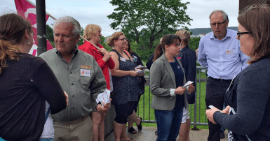 CUPE NL President Wayne Lucas and Newfoundland and Labrador NDP Leader Earl McCurdy joined the info picket outside the A.C. Hunter Public Library in St. John&#039;s.