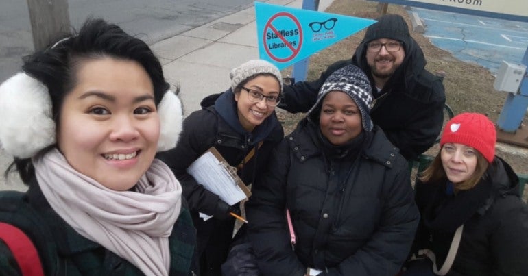 CUPE 4948 members getting the message out on staffless libraries.]