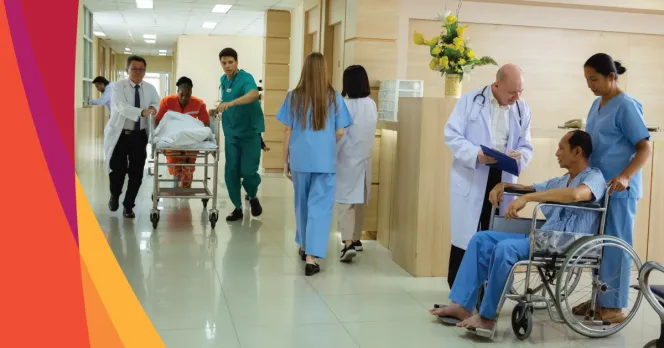 Hospital workers and patients inside a brightly lit hospital