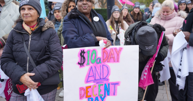 Woman holding a protest sign