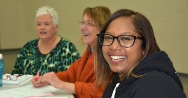 Smiling woman wearing glasses