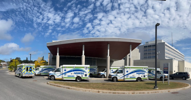 Ambulances parked outside of a hospital