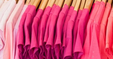 Pink shirts hanging up
