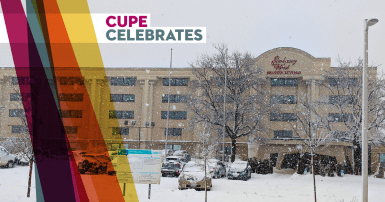 Embassy West Senior Living building with snow