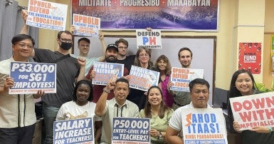 Photo of Raymond Basilio and international solidarity allies