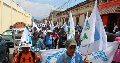 Workers rally in Guatemala - Cover for 2019-2020 International Solidarity Report