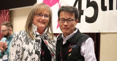 Kyung Kyu Yang from the Korean Federation of Public Services and Transportation Workers and Sherry Hillier at the 2019 CUPE NL division convention