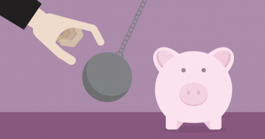 A wrecking ball moving towards a piggy bank