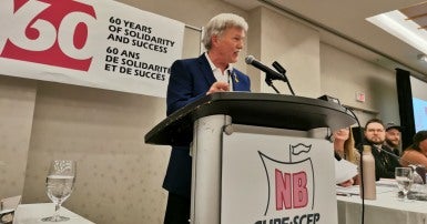 Stephen Drost addresses delegates at the CUPE New Brunswick convention