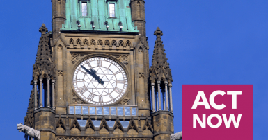 Clock at parliament hill with text "act now" on top