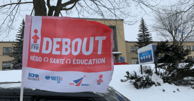 A stop in front of the Direction de la santé publique on Sherbrooke Street East in Montreal on February 19, 2021 as part of the “Toujours debout” tour. Photo CUPE