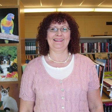 Photo of Patricia Mayo in the library