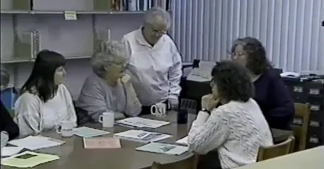Members sitting at a table
