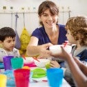 Image: Child care worker with children