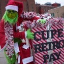 Grinch with box labelled CUPE Retro Pay