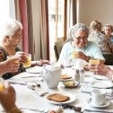 Seniors eating in a long-term care home