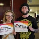 CUPE members holding "I <3 Public Health Care" signs