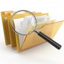 magnifying glass and photos