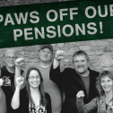 Paws off our pension! Black and white photo of a group of 10 people with their fists raised and a green banner above that says Paws off our pension