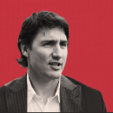 Photo of Justin Trudeau on red background.