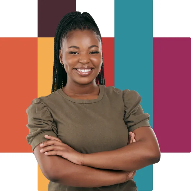 Person smiling with arms crossed in front of a colourful background.
