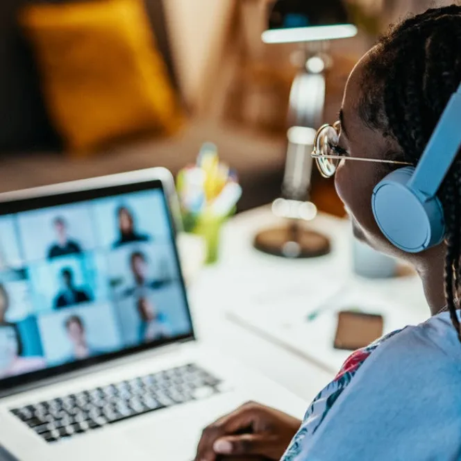 Woman with headphones in a meeting