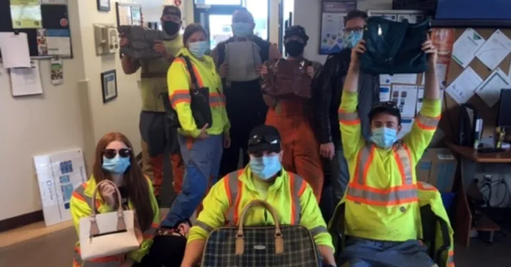 CUPE 30 members wearing masks and holding bags and purses