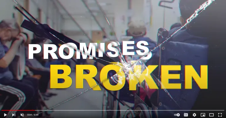 Promises Broken written behind broken glass