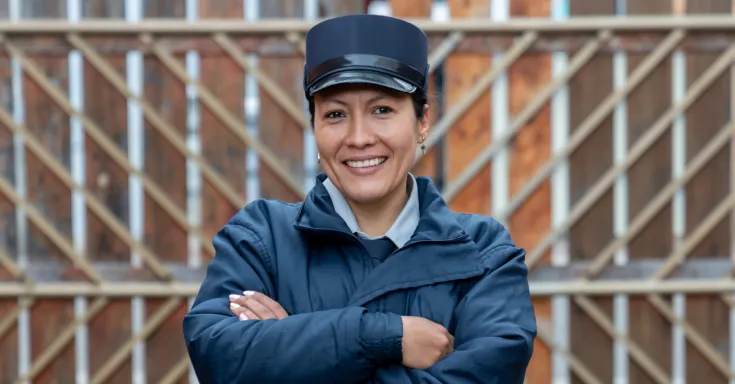 Portrait of a happy woman working as a security guard 