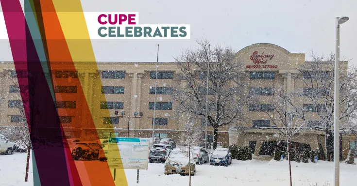 Embassy West Senior Living building with snow