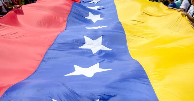 Venezuelan flag and people