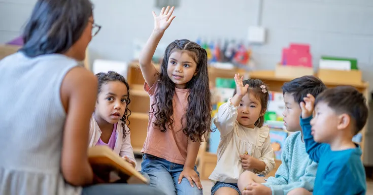 Librarian reading with children