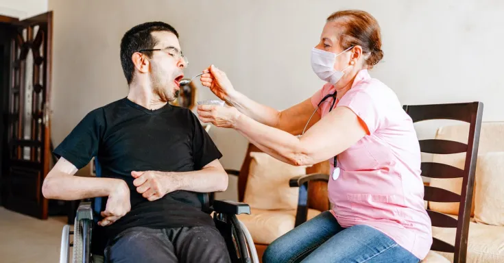 Support worker with a client with developmental disabilities