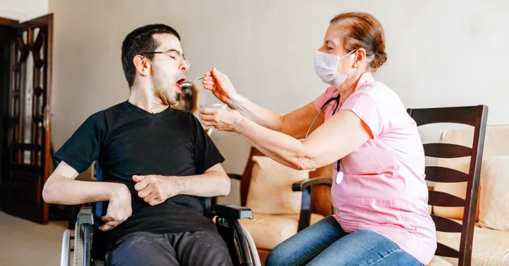 Worker with client with developmental disabilities