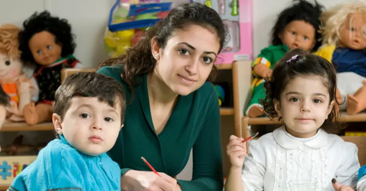 Child care worker with children