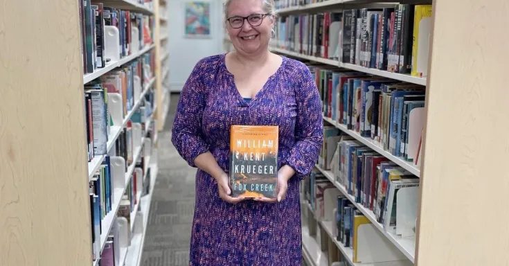 Woman holding a book 